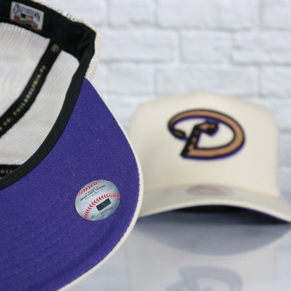 purple under visor on the Arizona Diamondbacks Cooperstown Evergreen Pro Purple bottom | Off White Trucker Hat
