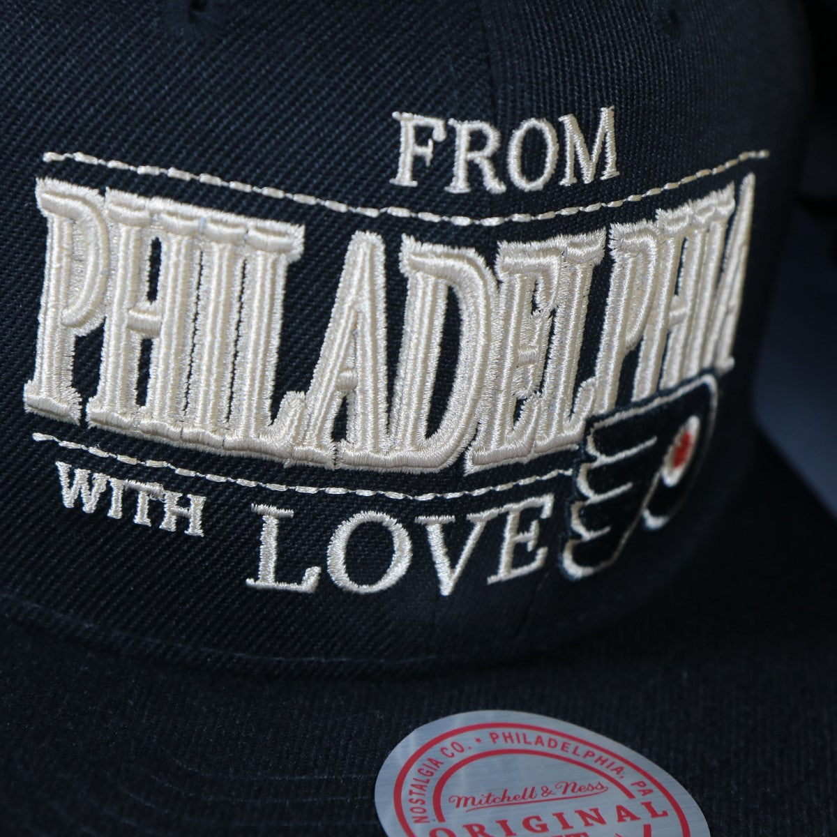 flyers logo on the Philadelphia Flyers With Love 25th Anniversary Side Patch Cream Bottom | Black Snapback Hat