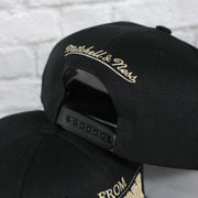 mitchell and ness logo on the New York Rangers With Love 75th Anniversary Side Patch Cream Bottom | Black Snapback Hat