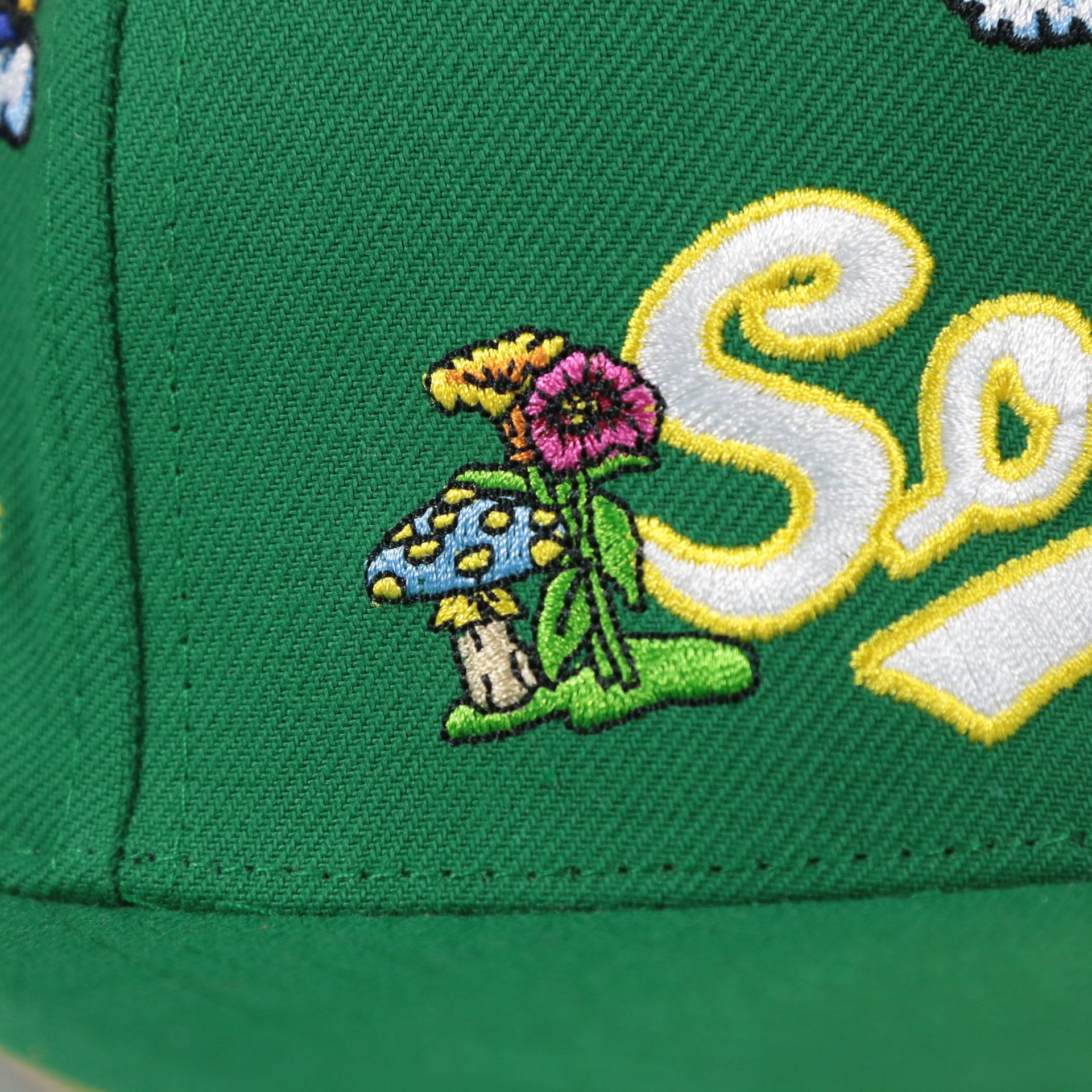 psychedelic patch on the Seattle Supersonics Throwback Wordmark Hardwood Classics  All Over Energy Psychedelic patch | Green Snapback hat