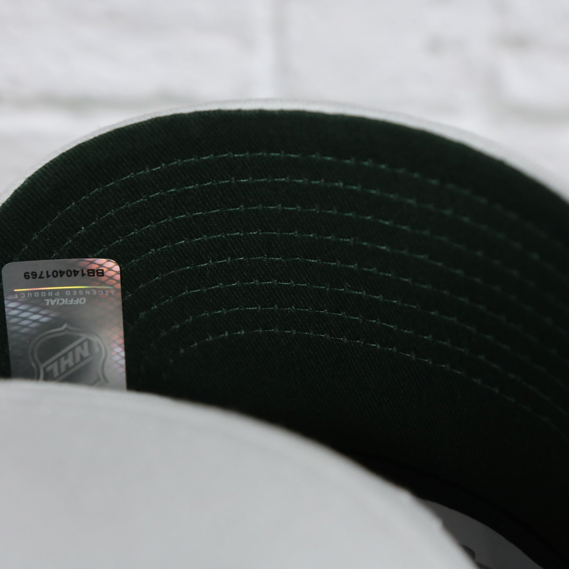 green under visor on the Minnesota Wild NHL All in Pro Green Bottom | White Snapback Hat