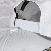 white adjustable snap on the Anaheim Ducks NHL All in Pro Sand Bottom | White Snapback Hat