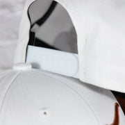 white adjustable snap on the Texas Longhorns NCAA All in Pro Brown Bottom | White Snapback Hat