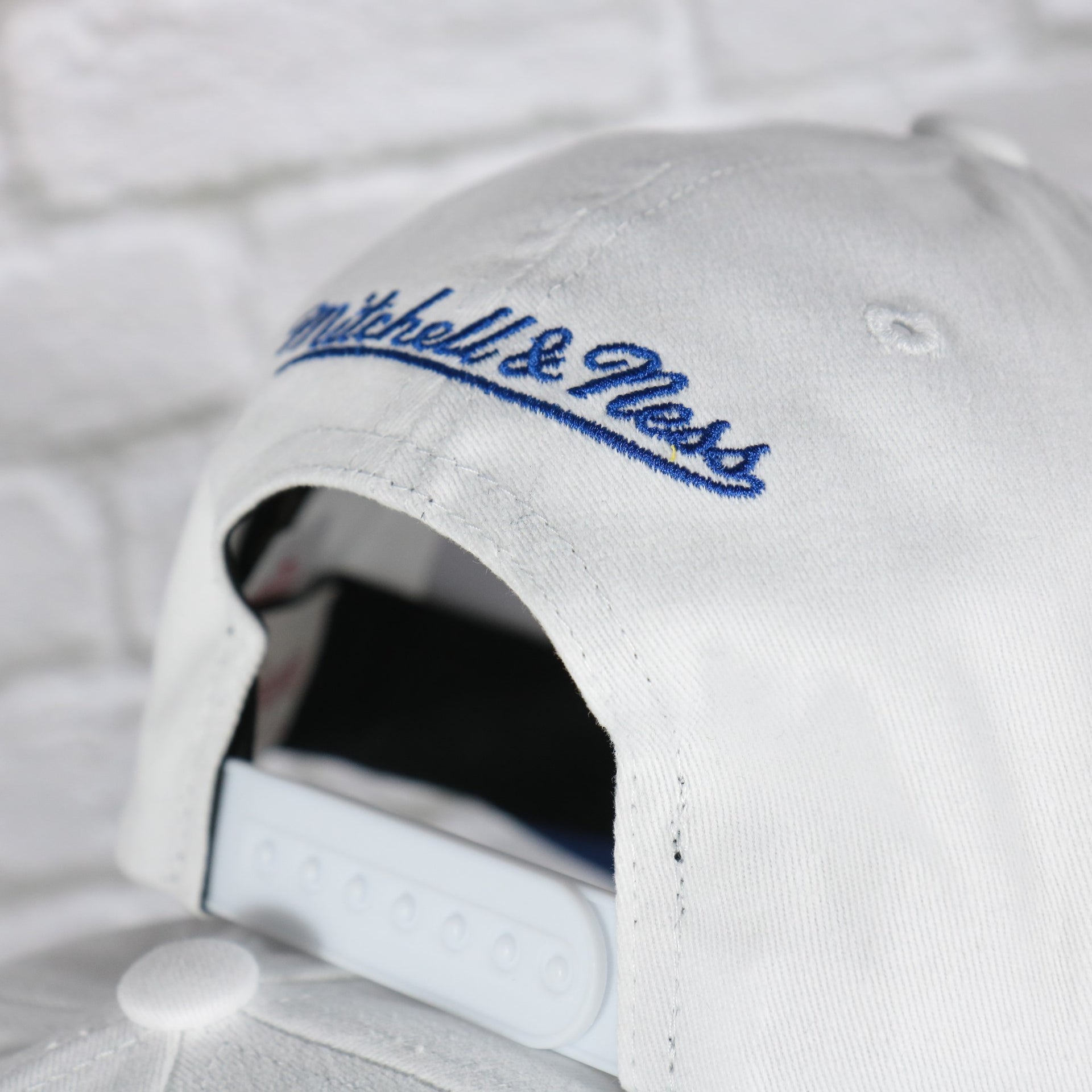 mitchell and ness logo on the New York Islanders NHL All in Pro Blue Bottom | White Snapback Hat