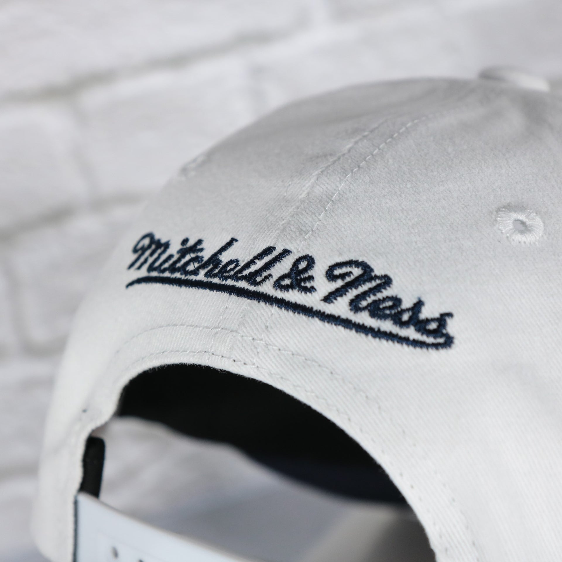mitchell and ness logo on the Edmonton Oilers NHL All in Pro Navy Bottom | White Snapback Hat