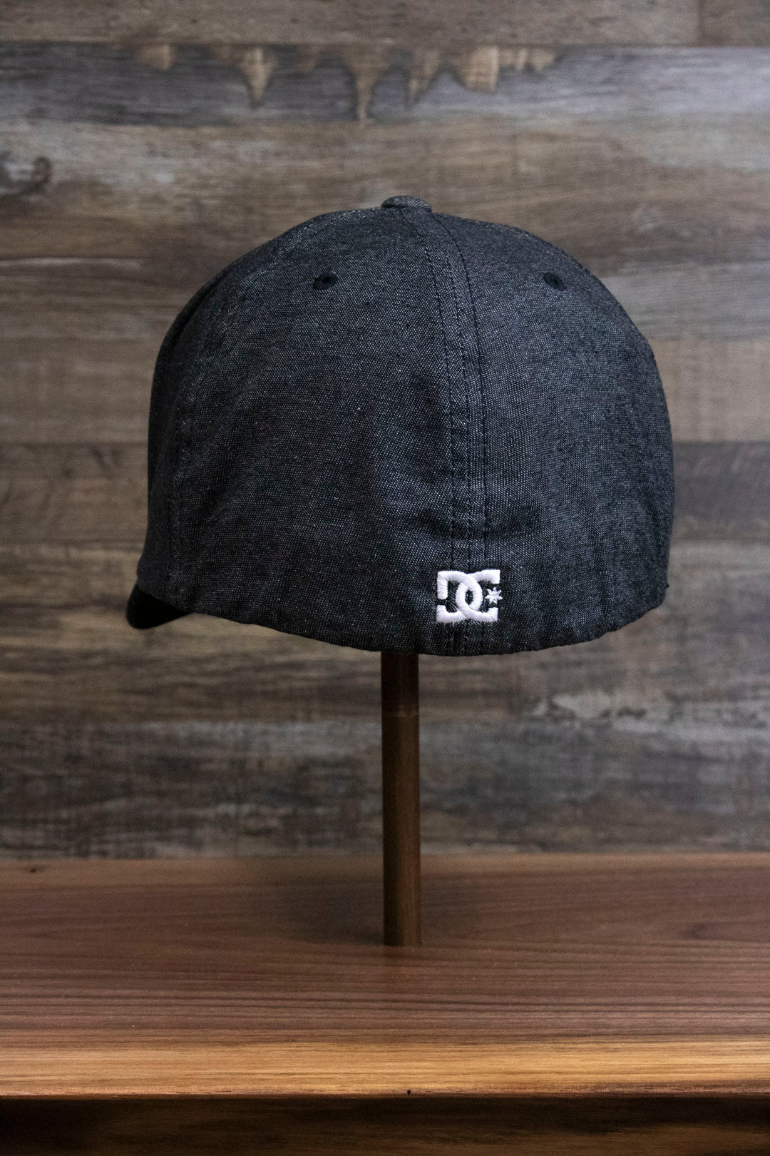 the back of the Dark Gray Bentbrim Skater Hat | DC Shoes Black Bottom Heather Gray Flexfit Cap is elastic for a flex fit