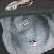 The Lining on the Women's Philadelphia Eagles On Field NFL Crucial Catch Intercept Cancer Patch Rainbow Pom Pom Winter Beanie | Graphite Gray Winter Beanie