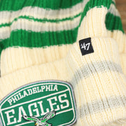 The 47 Brand Tag on the Throwback Philadelphia Eagles Legacy 1987 Eagles Patch Pom Pom Beanie | Natural Beanie
