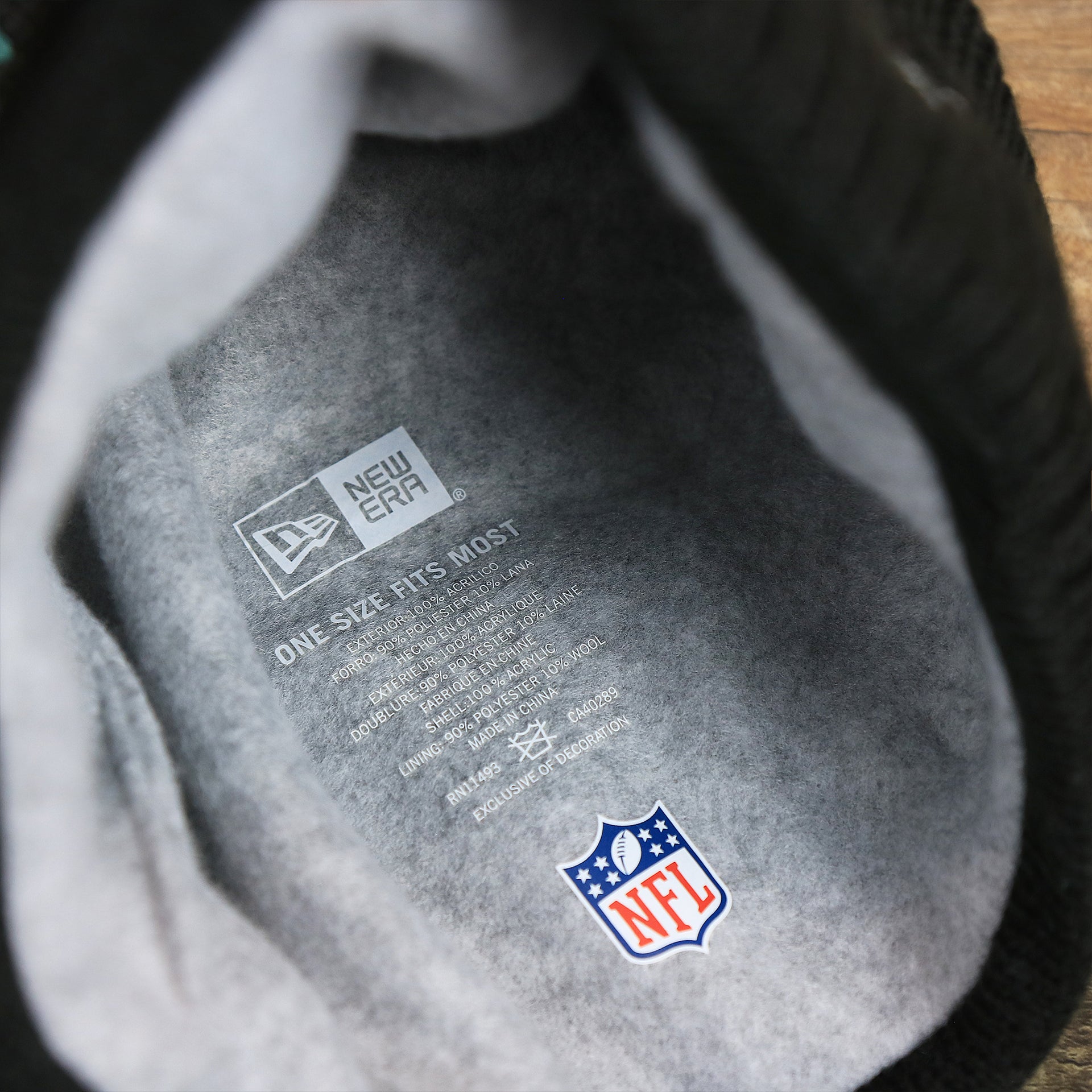 The Lining on the Philadelphia Eagles Sideline On Field Pom Pom Winter Beanie | Black Winter Beanie