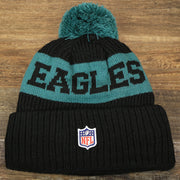 The backside of the Philadelphia Eagles Sideline On Field Pom Pom Winter Beanie | Black Winter Beanie