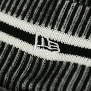 The New Era Logo on the Philadelphia Eagles On Field Cuffed Winter Pom Pom Beanie | Black And White Winter Beanie