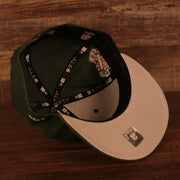 Gray under visor of the Green Bay Packers "Patch Up" Super Bowl XXXI Side Patch Gray Bottom 9Fifty Navy Snapback Hat