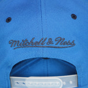 The Mitchell And Ness Wordmark on the Thunder Snapback Hat | Oklahoma City Thunder Reflective 2-Tone Snap Cap