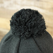 The Black Pom Pom on the Toronto Raptors NBA City Series Metallic Gold Leaf Winter Beanie | Black Winter Beanie