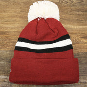 The backside of the Throwback Philadelphia Eagles White Logo Striped Cuffed Winter Beanie | Maroon Winter Beanie