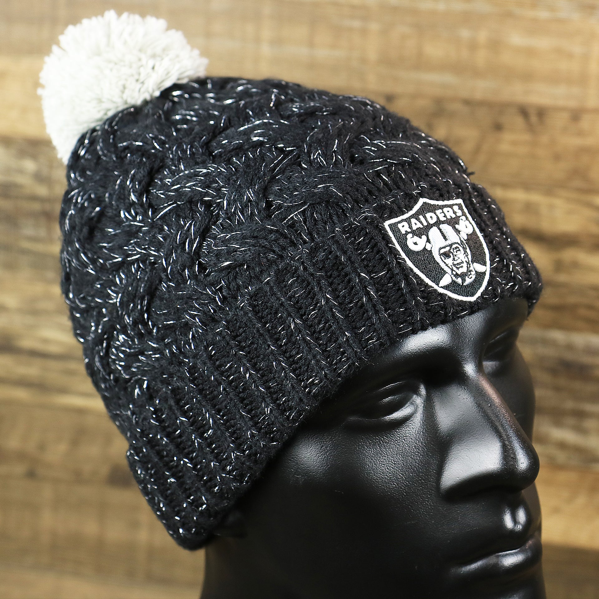 The Women’s Las Vegas Raiders Reflective Silver Cuffed Pom Pom Winter Beanie | Black Winter Beanie