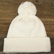 The backside of the Philadelphia Eagles Script Cuffed Winter Beanie With Pom Pom | Ivory Winter Beanie