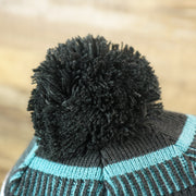 The Black Pom Pom on the Philadelphia Eagles Patch 1933 On Field Striped Eagles Colorway Pom Pom Winter Beanie | Black and Midnight Green Winter Beanie