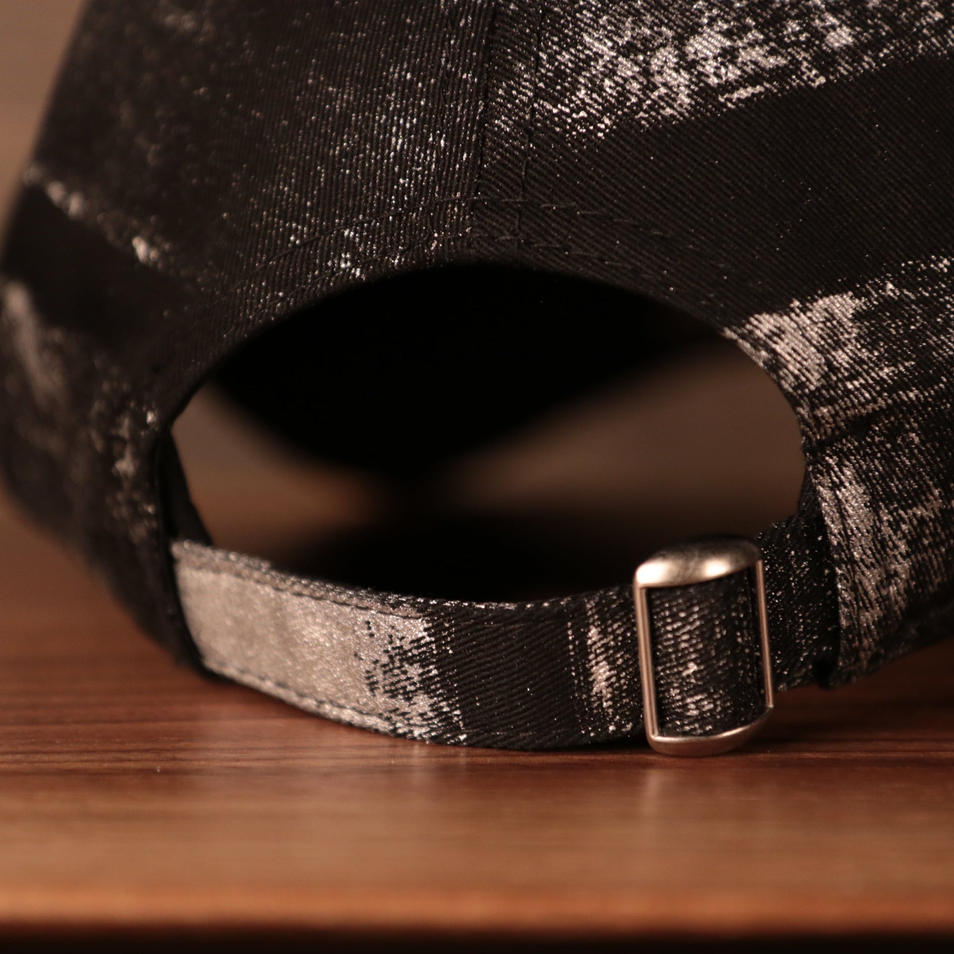 the strap on the back of this mickey dad hat is black and silver Mickey Mouse Black Dad Hat | Angry Mickey Mouse Black Dad Cap