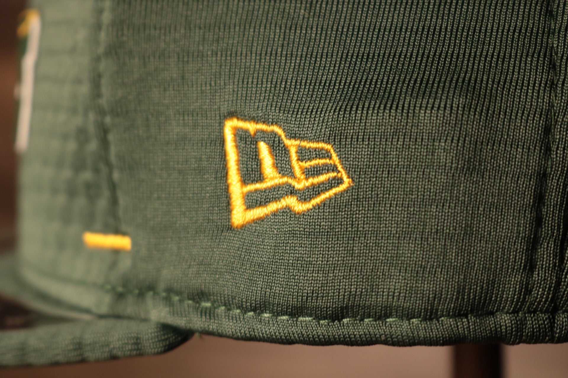 Packers 2020 Training Camp Snapback Hat | Green Bay Packers 2020 On-Field Green Training Camp Snap Cap the new era logo is in yellow