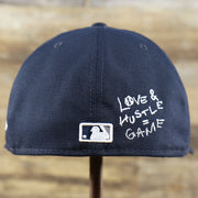 The backside of the New York Yankees Baseball Heart Gray Bottom World Series 59Fifty Fitted Cap | Navy 59Fifty Cap