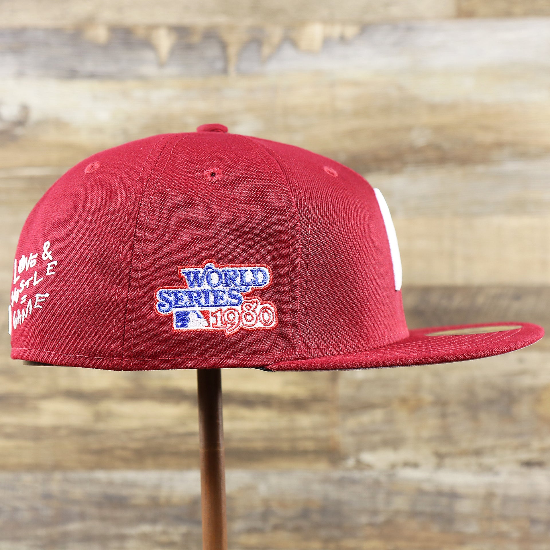 The wearer's right on the Cooperstown Philadelphia Phillies Baseball Heart Gray Bottom World Series 59Fifty Fitted Cap | Maroon 59Fifty Cap