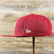 The wearer's left of the Cooperstown Philadelphia Phillies Baseball Heart Gray Bottom World Series 59Fifty Fitted Cap | Maroon 59Fifty Cap