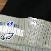 The 47 Brand Tag on the Philadelphia Eagles 2017 NFC Champions Gray Cuff NFL Pom Pom Winter Beanie | Black Winter Beanie