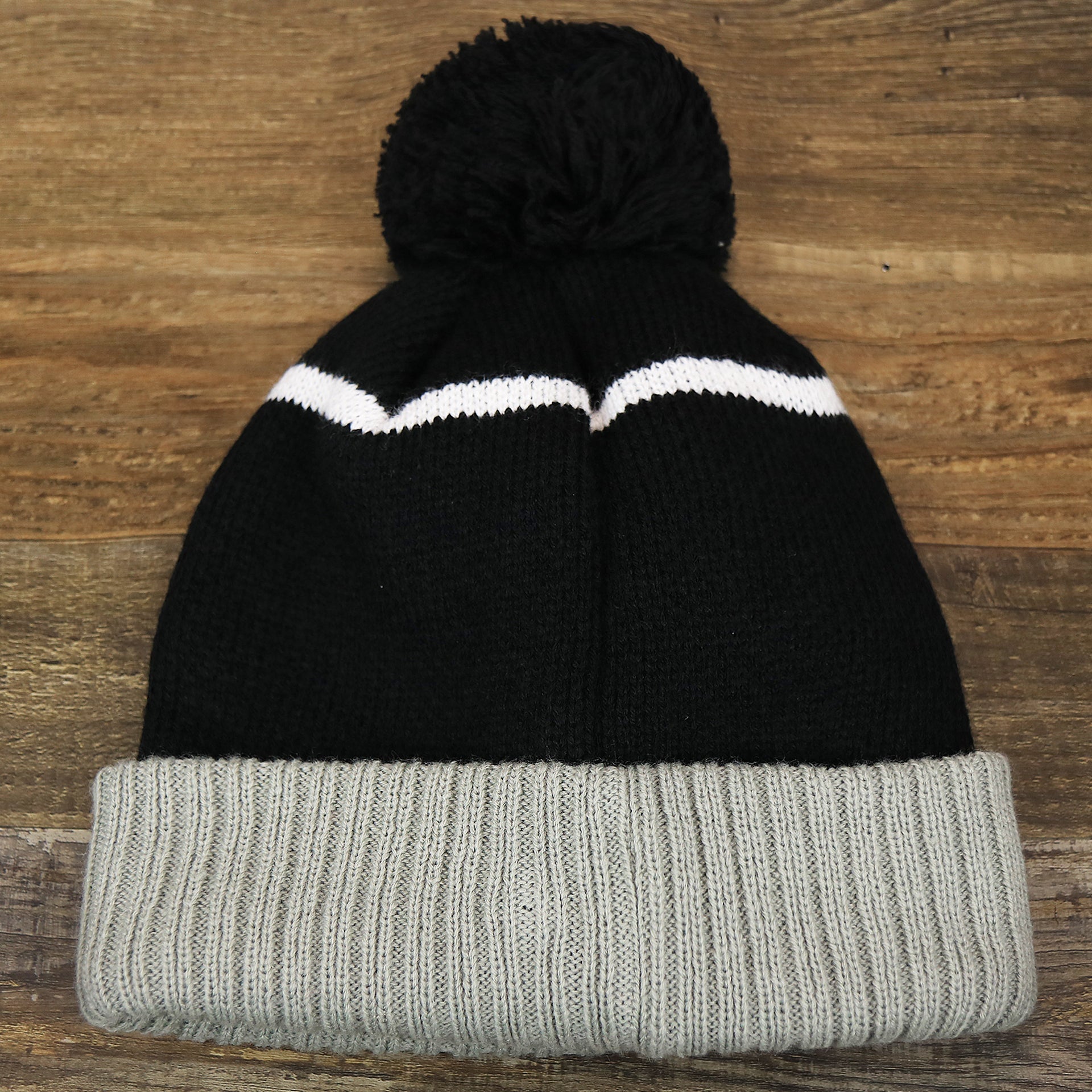 The backside of the Philadelphia Eagles 2017 NFC Champions Gray Cuff NFL Pom Pom Winter Beanie | Black Winter Beanie