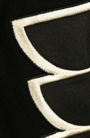 embroidering on the Philadelphia Flyers Vintage Hockey 47 Lacer Hoodie |  Black, Gray, White