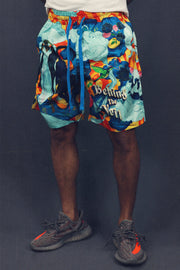 front of the Men’s Sunshine Surf Trunks Board Shorts To Match Sneakers | Orange and Teal