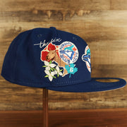 Wearer's right of the Toronto Blue Jays "City Cluster" Side Patch Gray Bottom Royal 59Fifty Fitted Cap