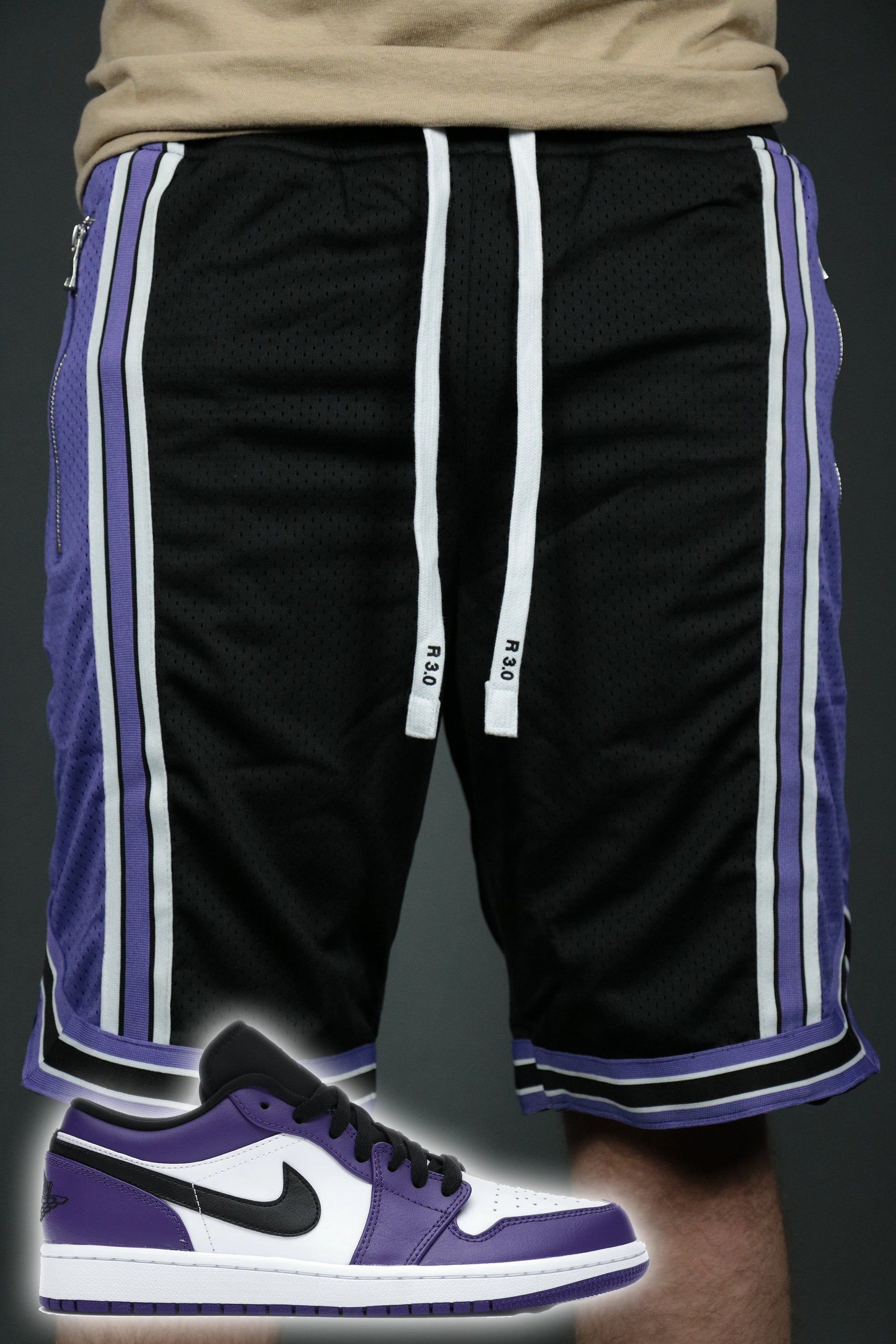 The Sacramento black purple shorts to match Air Jordan 1 Low Court Purple sneakers by Jordan Craig.