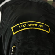 2X champions patch on the Florida Marlins MLB Patch Alpha Industries Reversible Bomber Jacket With Camo Liner | Black Bomber Jacket