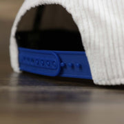 A close up of the adjustable strap on the Corduroy Philadelphia Athletics Cooperstown Snapback | 47 Brand White