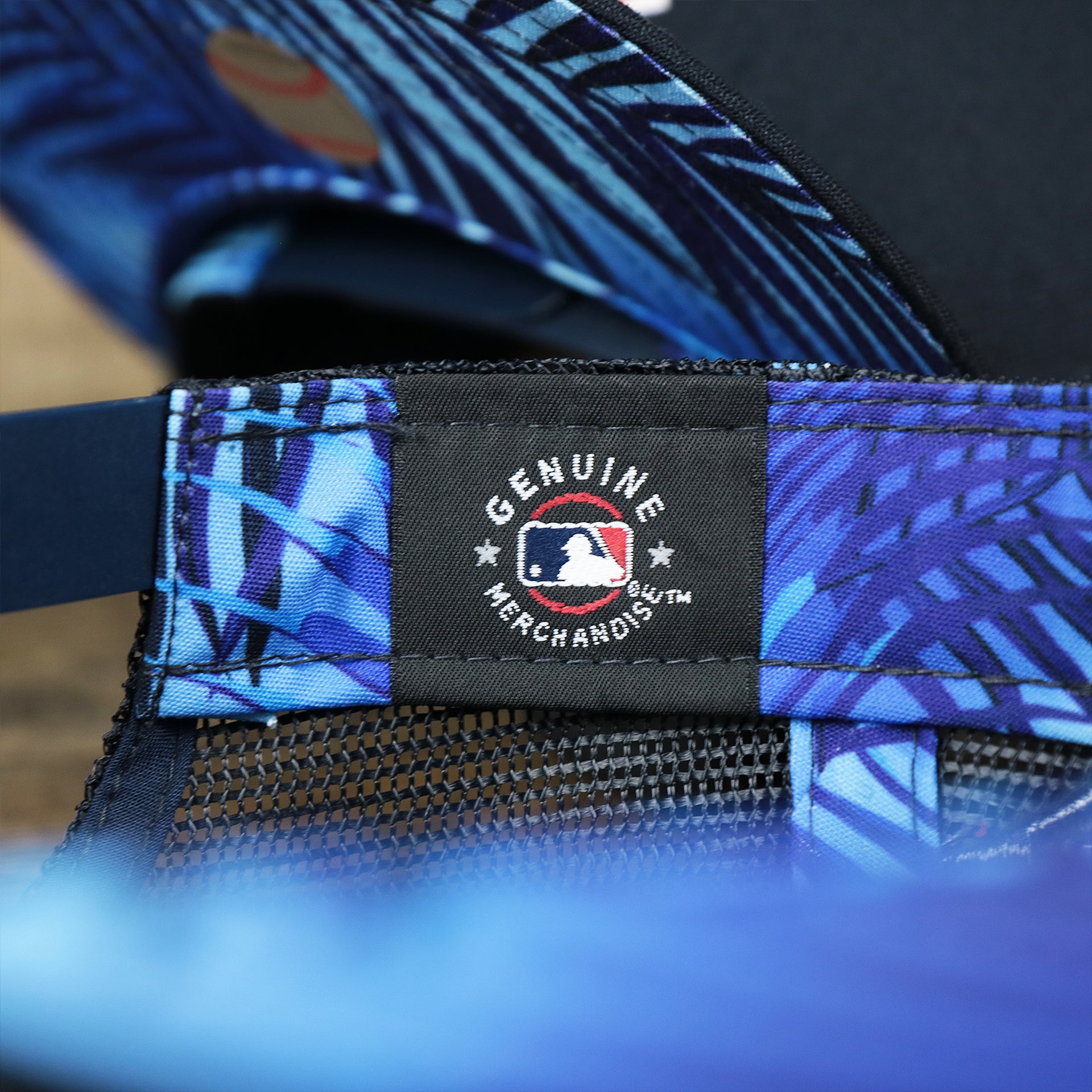 The MLB Merchandise Tag on the Boston Red Sox Metallic All Star Game MLB 2022 Side Patch 9Fifty Mesh Snapback | ASG 2022 Navy Trucker Hat