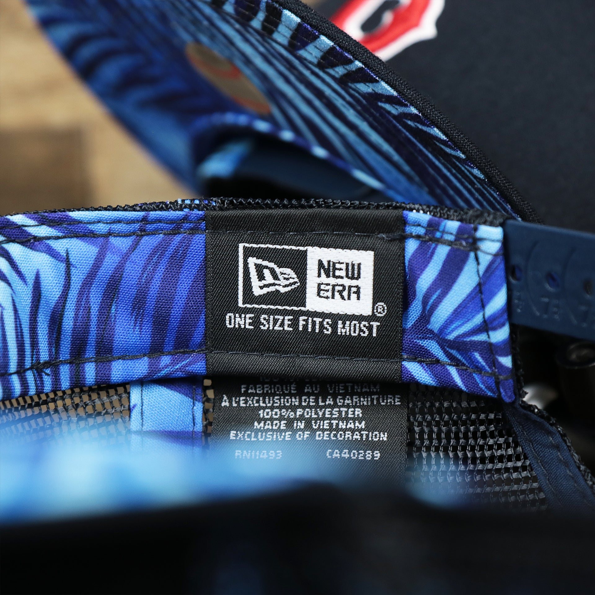 The New Era Tag on the Boston Red Sox Metallic All Star Game MLB 2022 Side Patch 9Fifty Mesh Snapback | ASG 2022 Navy Trucker Hat