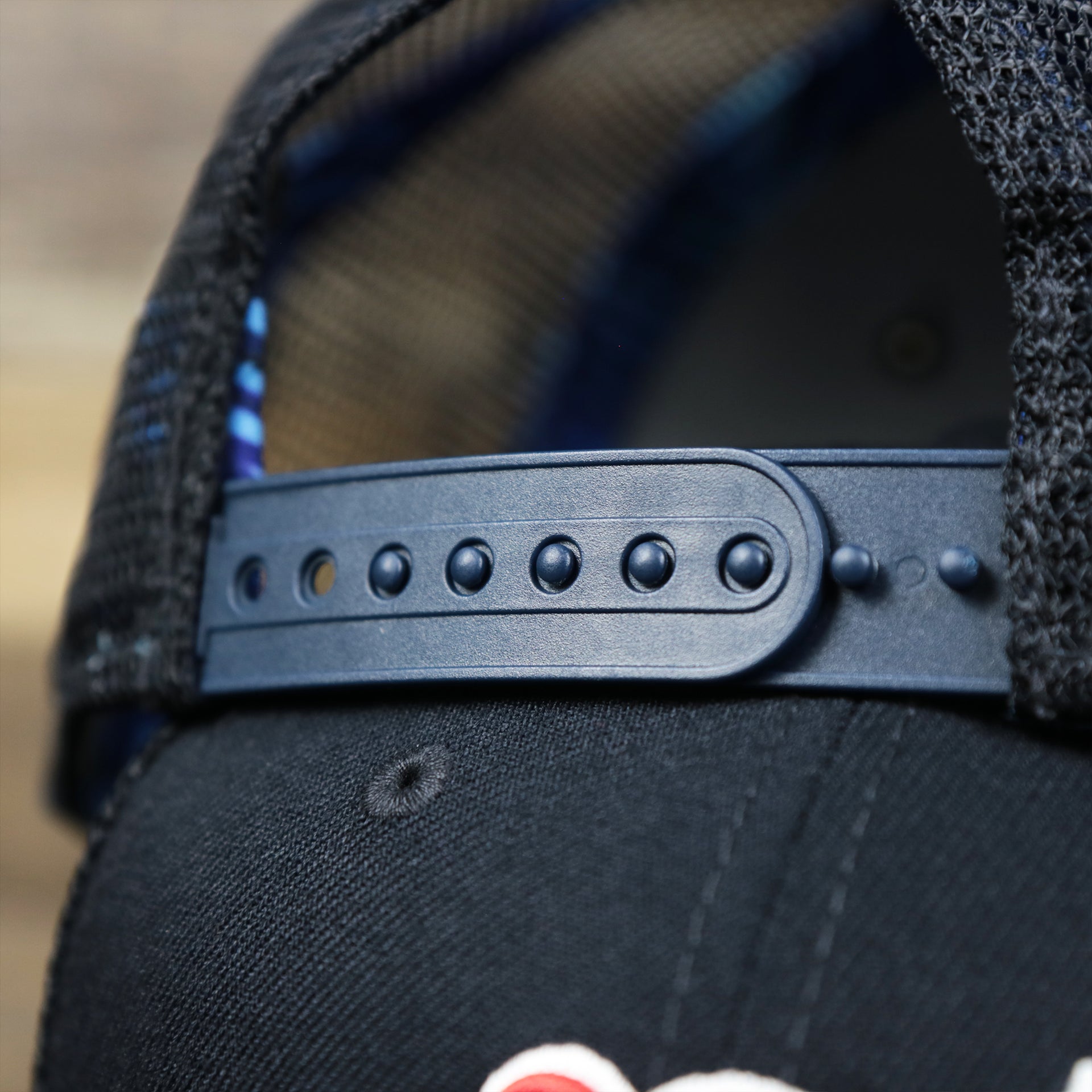 The Navy Adjustable Strap on the Boston Red Sox Metallic All Star Game MLB 2022 Side Patch 9Fifty Mesh Snapback | ASG 2022 Navy Trucker Hat