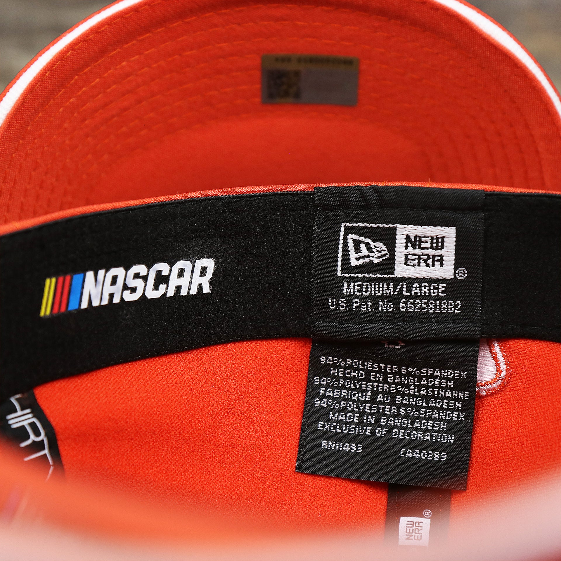 The Tags on the Nascar Chase Elliot Number 9 Hendrick Motorsport Hooters Logo 39Thirty FlexFit Cap | Orange 39Thirty Cap