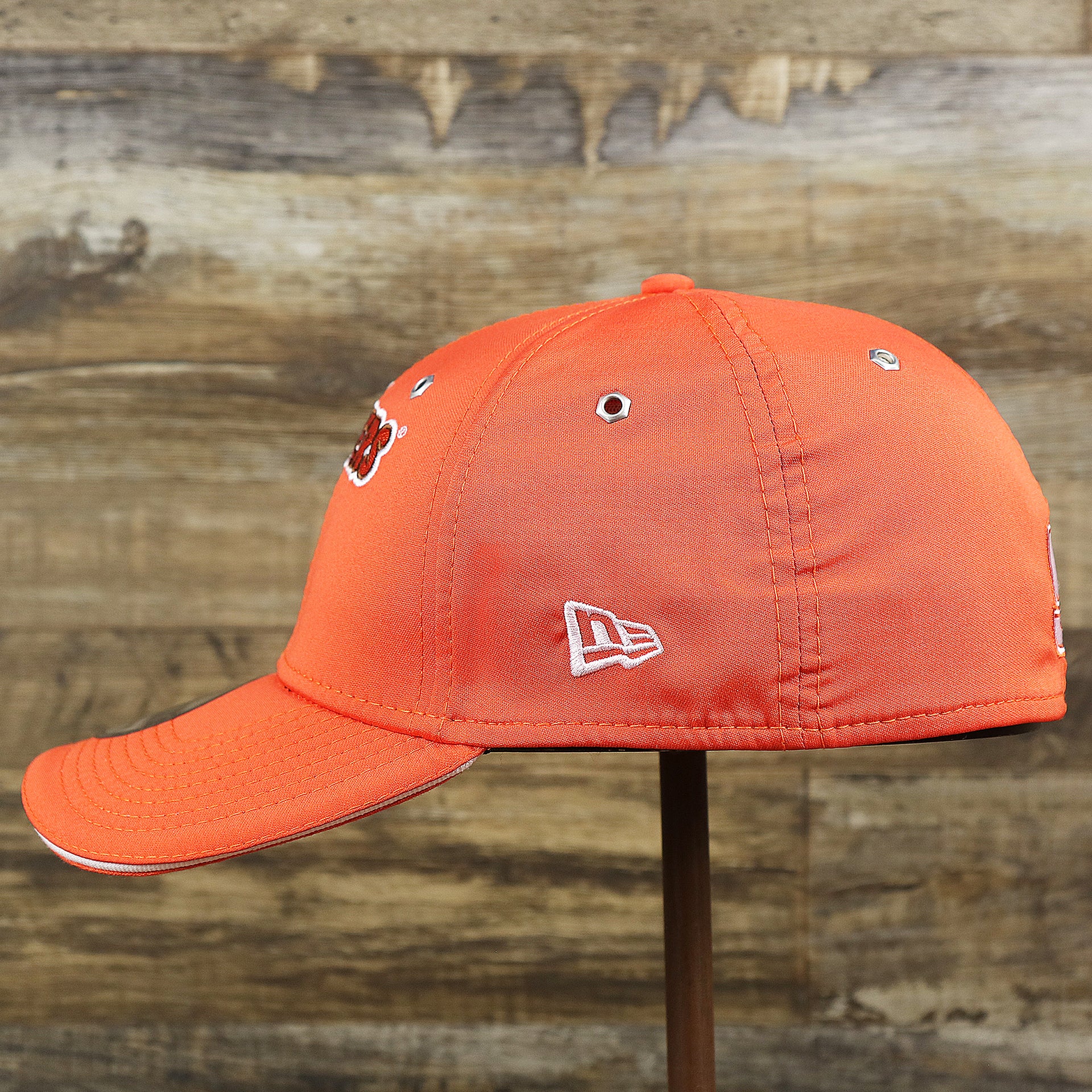 The wearer's left of the Nascar Chase Elliot Number 9 Hendrick Motorsport Hooters Logo 39Thirty FlexFit Cap | Orange 39Thirty Cap