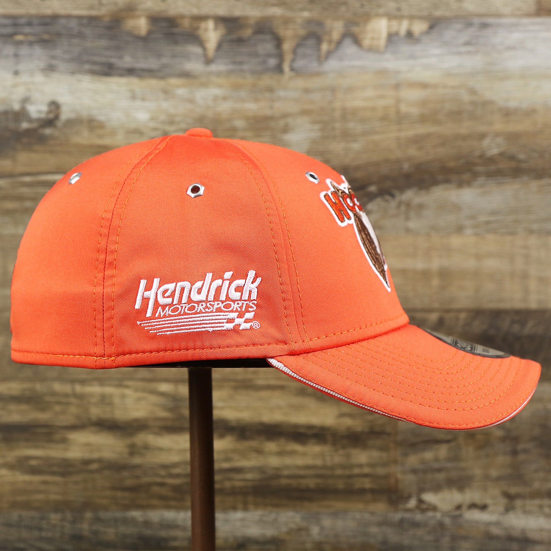 The wearer's right on the Nascar Chase Elliot Number 9 Hendrick Motorsport Hooters Logo 39Thirty FlexFit Cap | Orange 39Thirty Cap