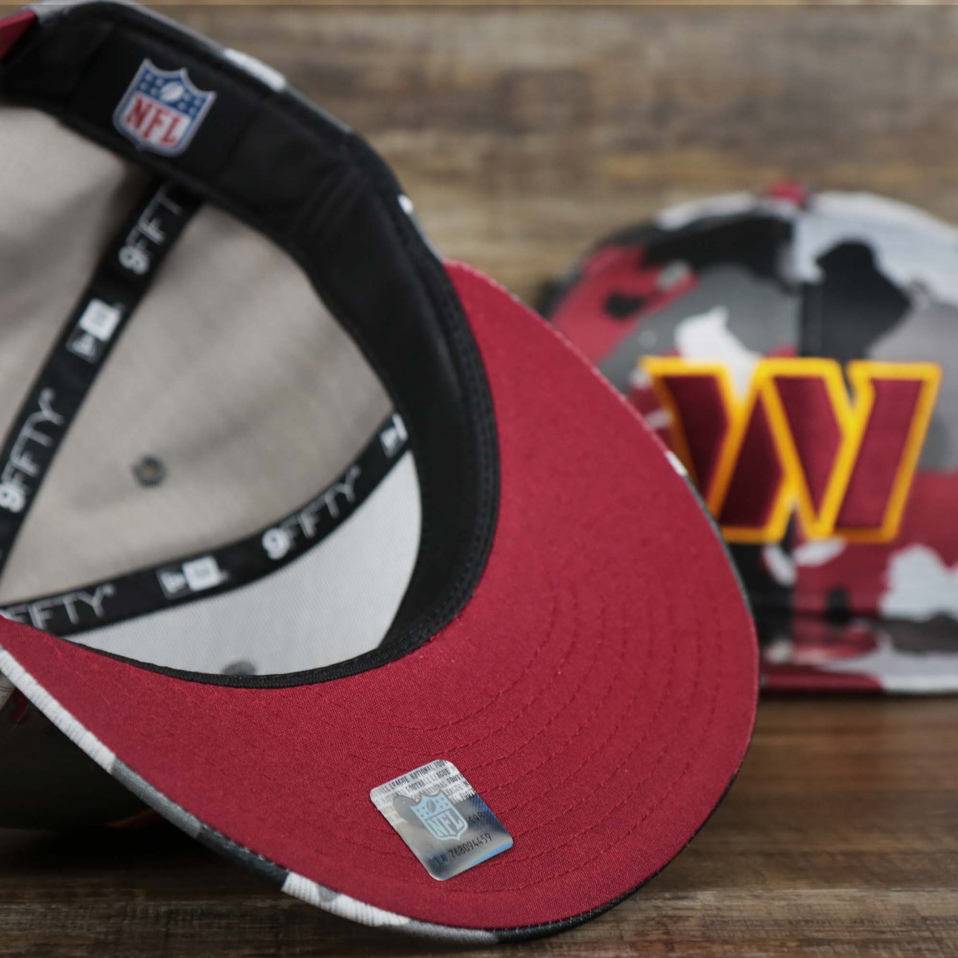 The undervisor on the Washington Commanders NFL OnField Summer Training 2022 Camo 9Fifty Snapback | Burgundy Camo 9Fifty