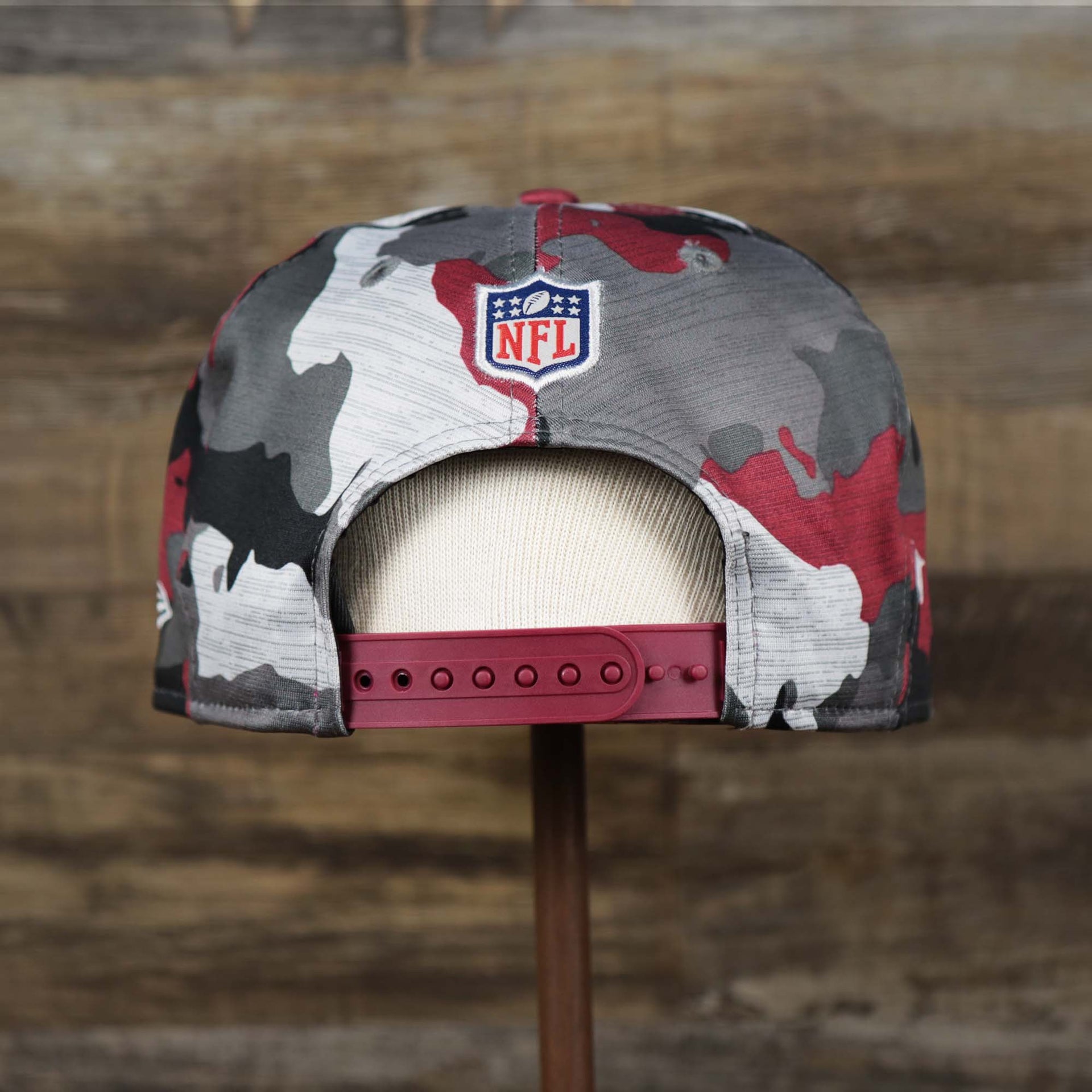 The backside of the Washington Commanders NFL OnField Summer Training 2022 Camo 9Fifty Snapback | Burgundy Camo 9Fifty