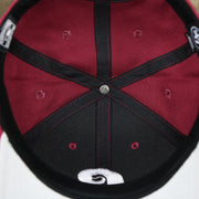 The inside of the Cooperstown Philadelphia Phillies Retro Phillies Logo Gray Bottom Dad Hat | Maroon Dad Hat