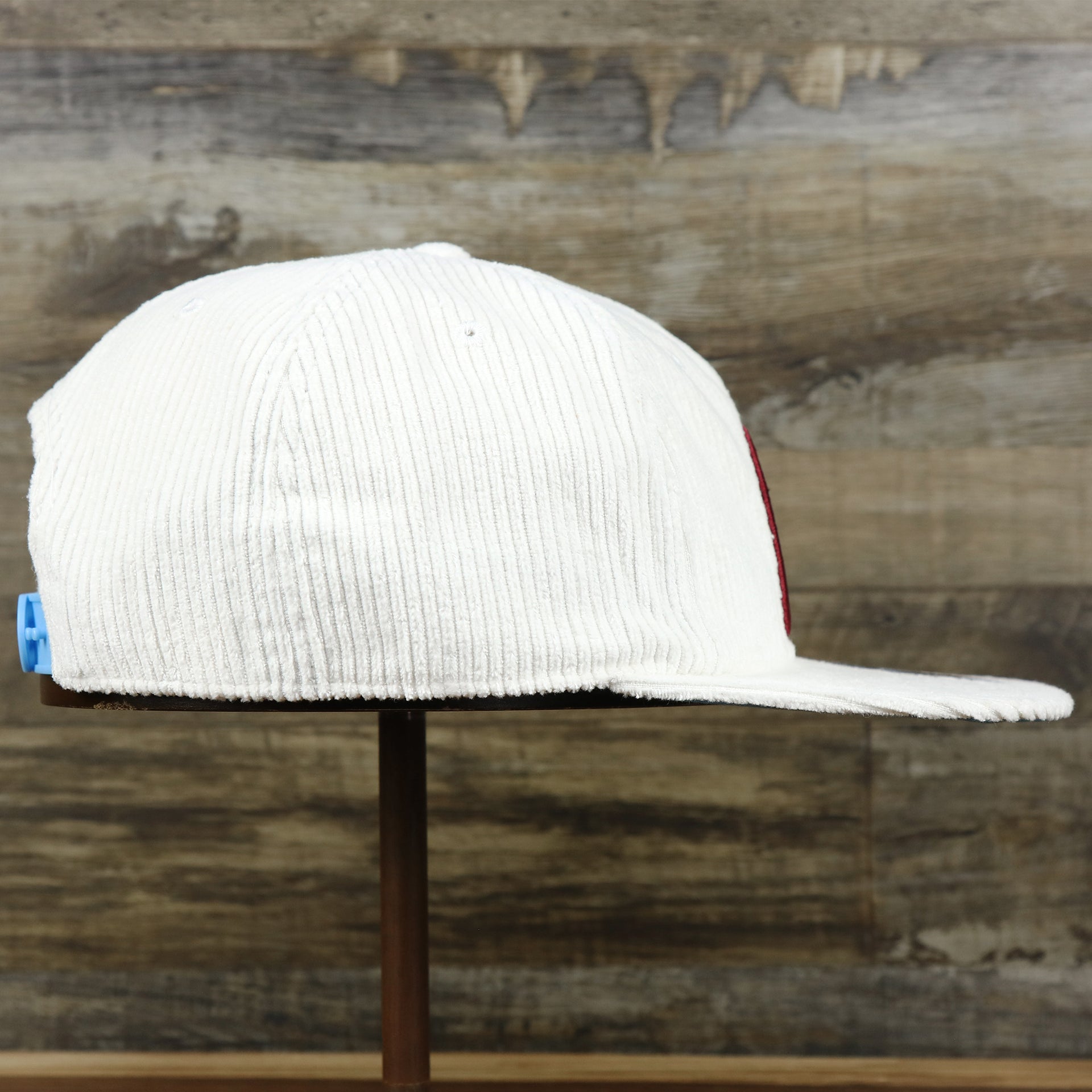 The wearer's right on the Cooperstown Philadelphia Phillies Corduroy Snapback Hat | White Corduroy Snap Cap