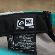 The New Era Tag on the Miami Dolphins NFL OnField Summer Training 2022 Camo 9Fifty Snapback | Turquoise Camo 9Fifty