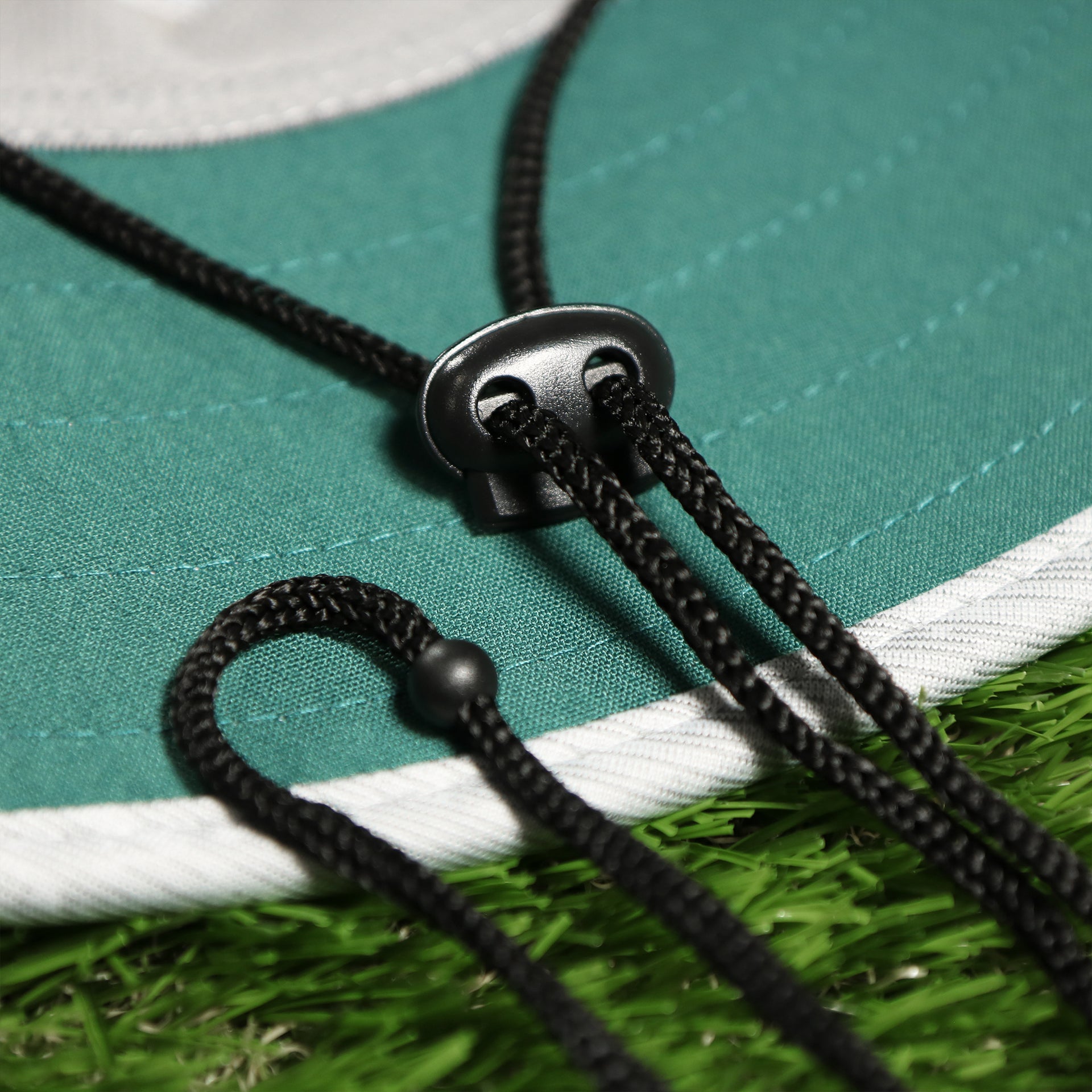 The Black Chin Strap on the Philadelphia Eagles Summer Training Camp Wide Brim Panama Bucket Hat | Distinct Gray Bucket Hat