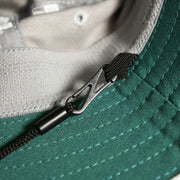 The detatchable strap on the Philadelphia Eagles Summer Training Camp Short Brim Bucket Hat | Distinct Gray Bucket Hat