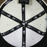 The inside of the Throwback Philadelphia Eagles Chrome Logo NFL Eagles SIde Patch 59Fifty Fitted Cap | Cream Fitted Cap