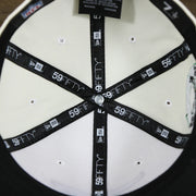 Interior taping of the Philadelphia Eagles Throwback Wordmark Jersey Script Cream/Kelly Green Black UV Side Patch 59Fifty Fitted Cap | Cap Swag Exclusive